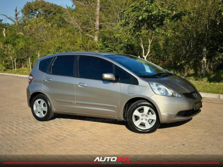 HONDA - FIT - 2009/2009 - Dourada - R$ 39.900,00