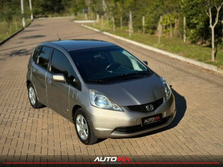 HONDA - FIT - 2009/2009 - Dourada - R$ 39.900,00