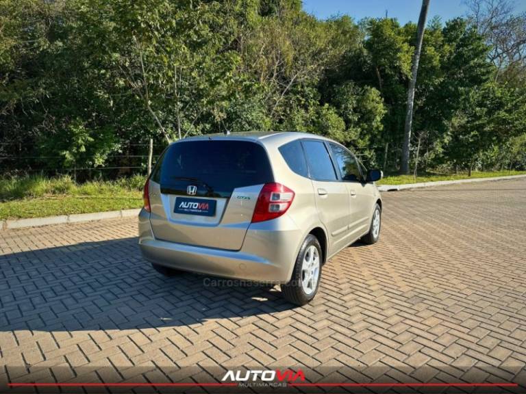HONDA - FIT - 2009/2009 - Dourada - R$ 39.900,00